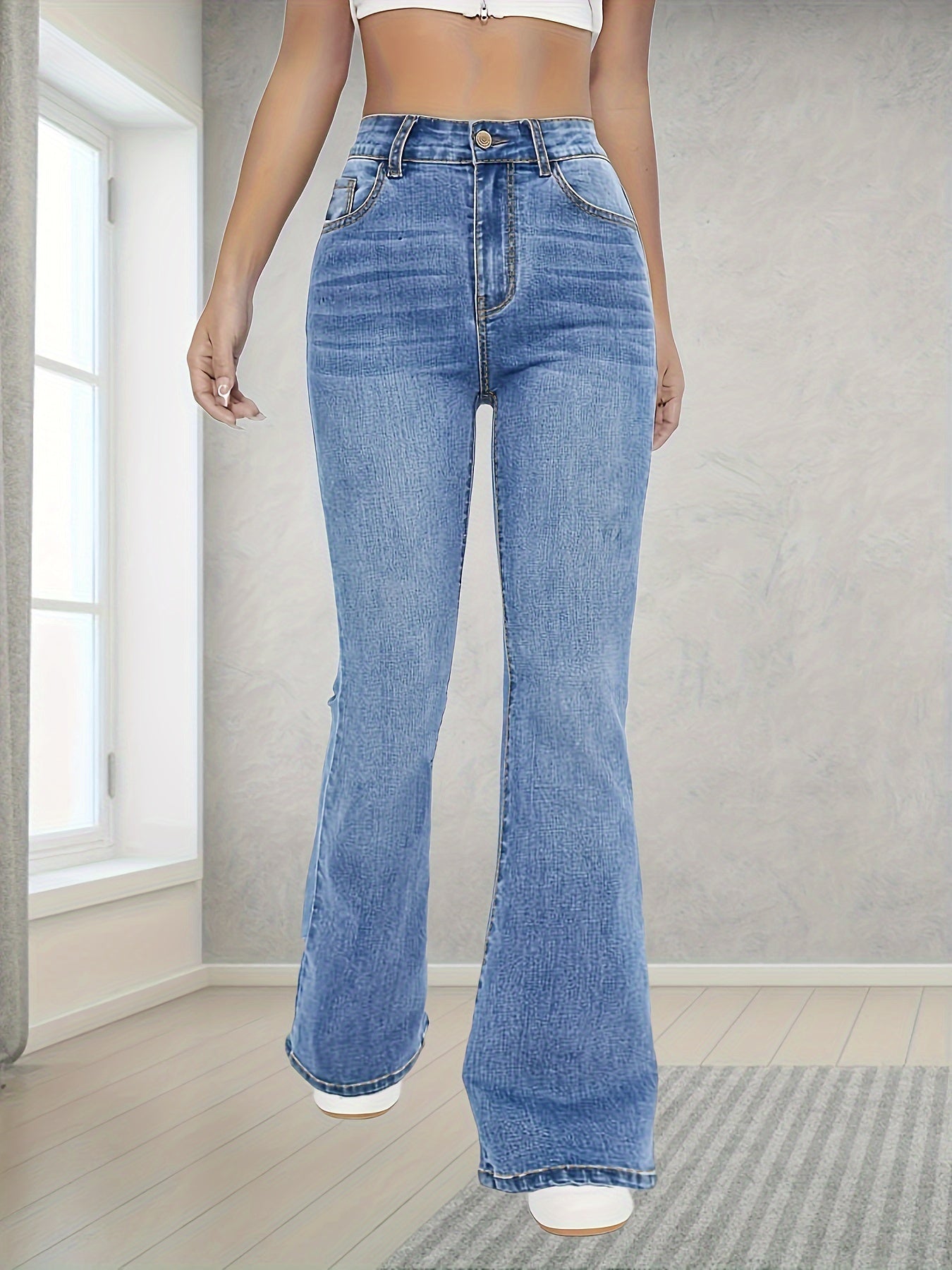 Fashionable And Versatile High-Waisted Stretchy Blue Flared Jeans for Women.