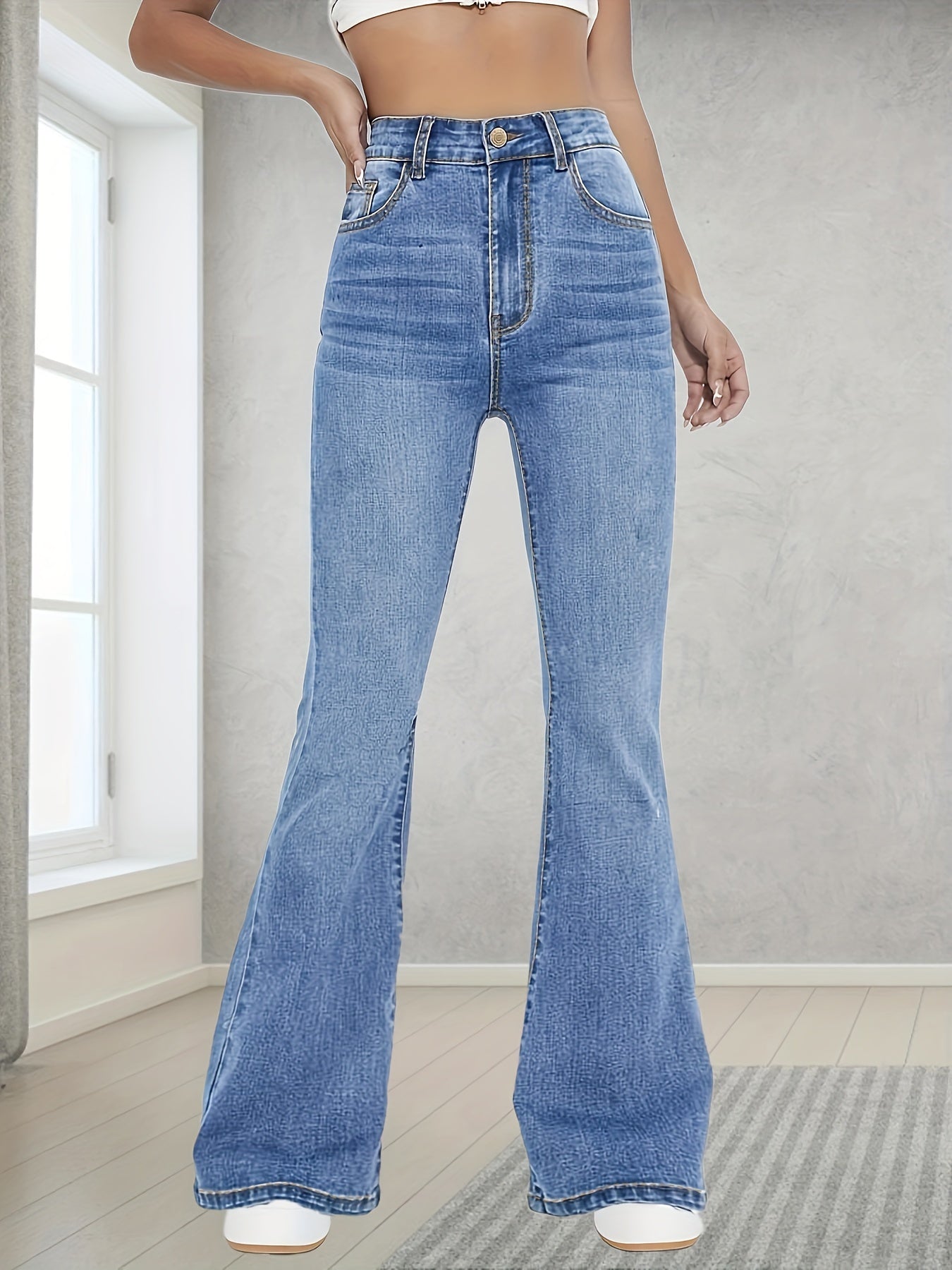 Fashionable And Versatile High-Waisted Stretchy Blue Flared Jeans for Women.