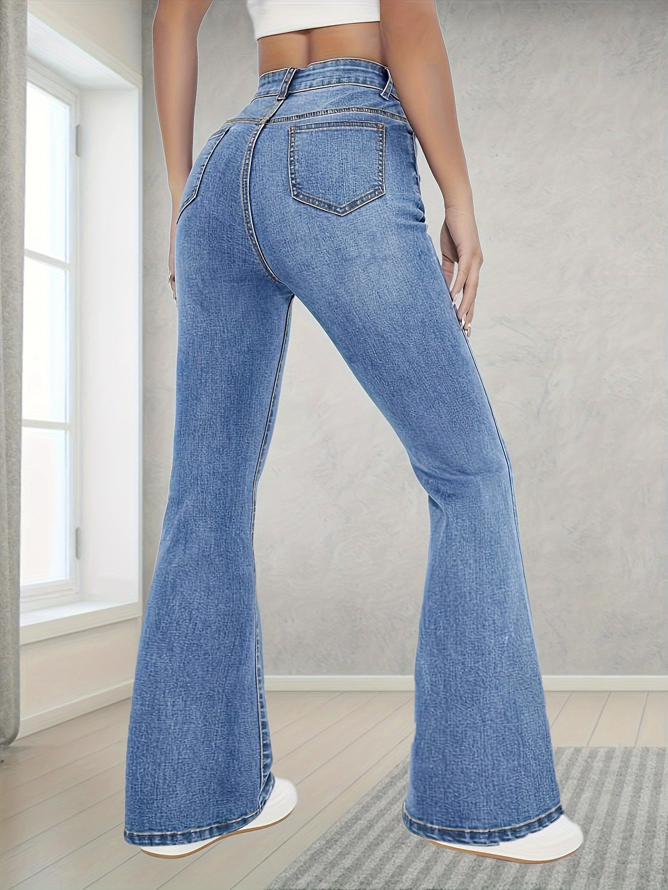 Fashionable And Versatile High-Waisted Stretchy Blue Flared Jeans for Women.