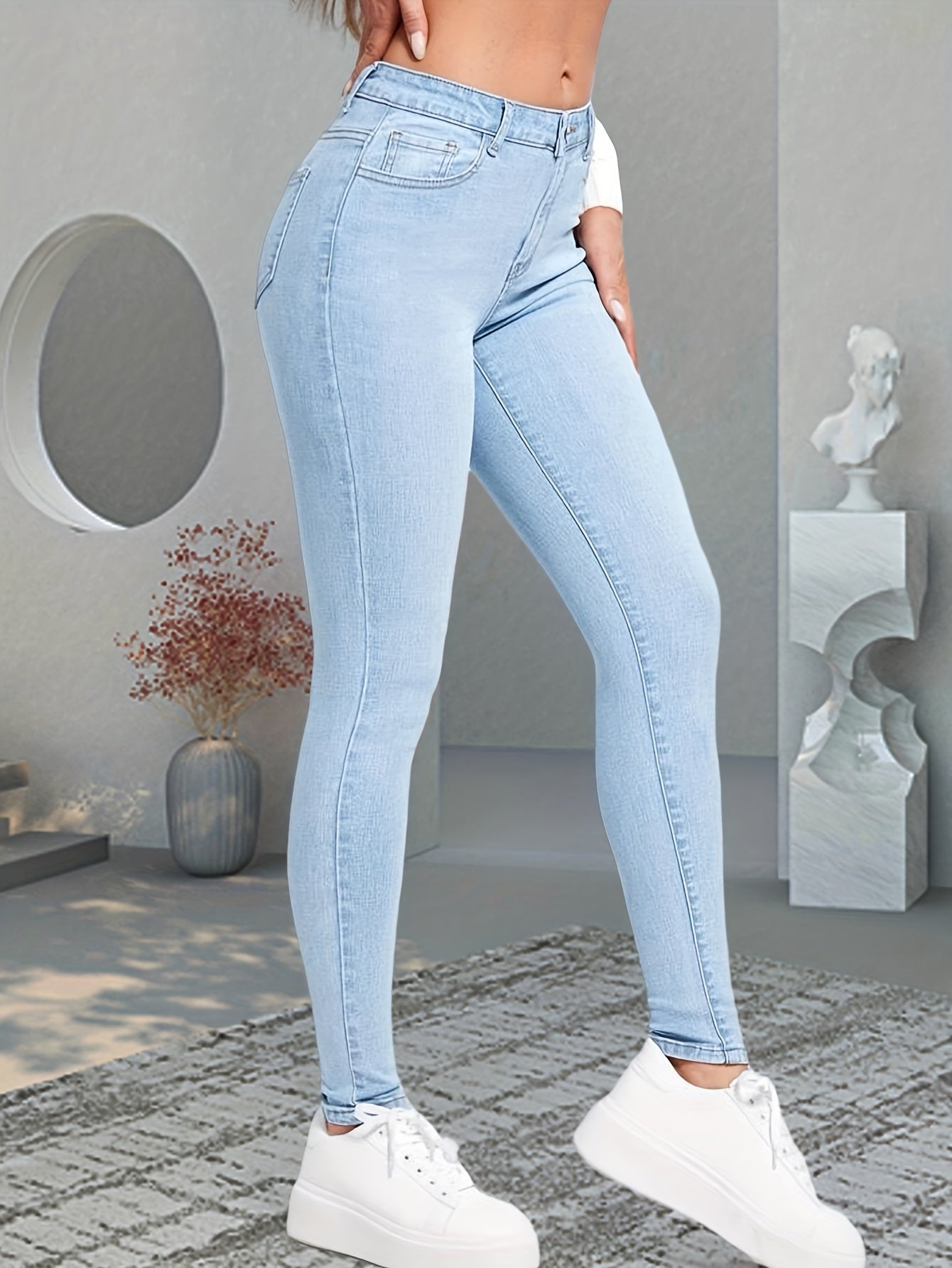 Women's Light Blue Skinny Jeans - Stretch Denim with Slim Fit, Slant Pockets & Button Closure | Versatile All-Season Casual Wear